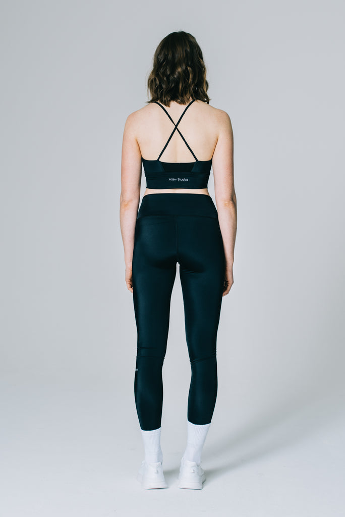 Attain Studios - Leggings in black with high-waisted design has a slight sculpting effect, made out of recycled material.